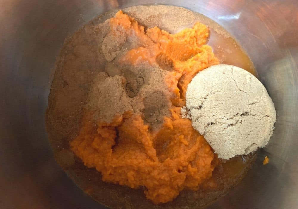 ingredients for pumpkin butter combined in the Instant Pot prior to cooking