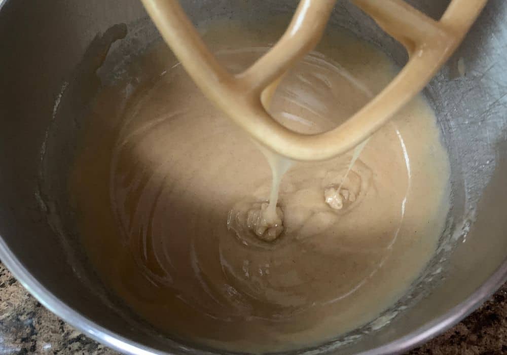 batter for buttermilk texas sheet cake in the bowl of a stand mixer