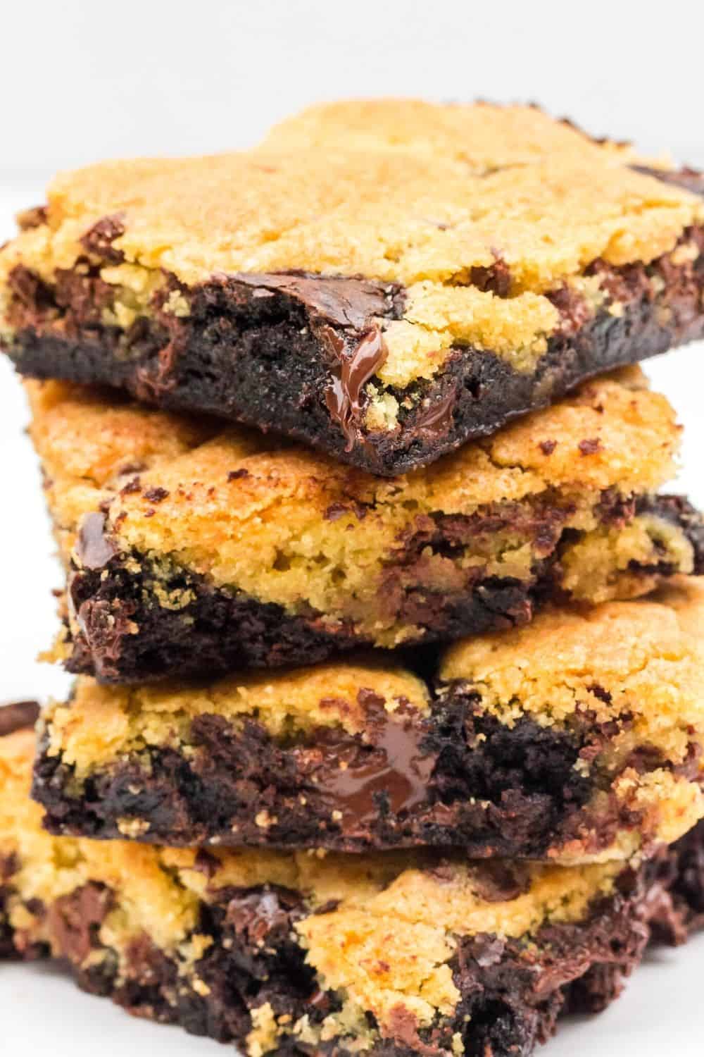 stack of copycat domino's brownie cookie bars on a white plate