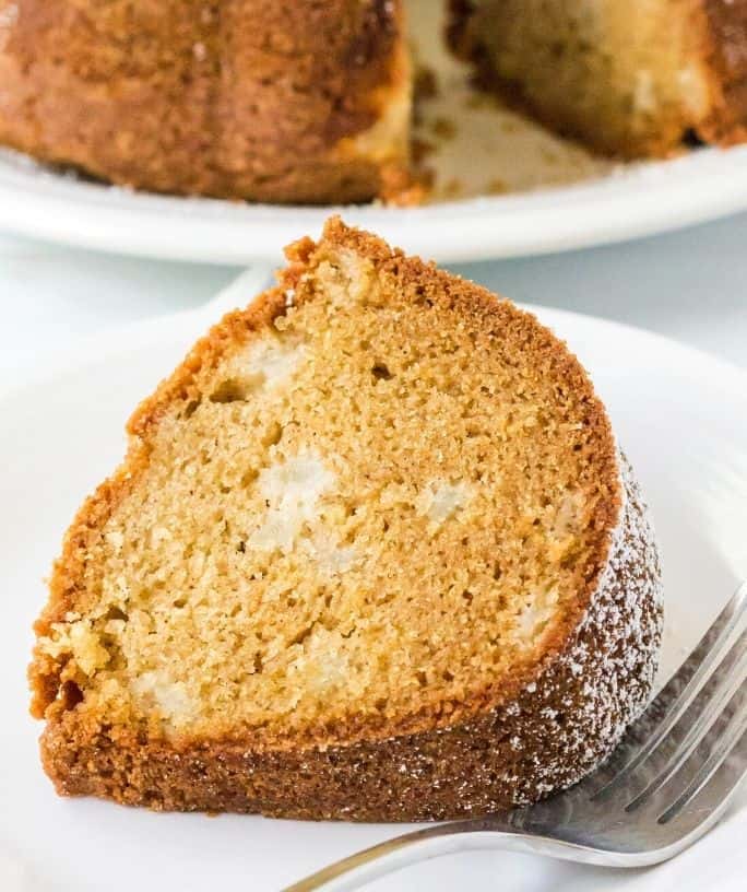 slice of pear cake on a white plate