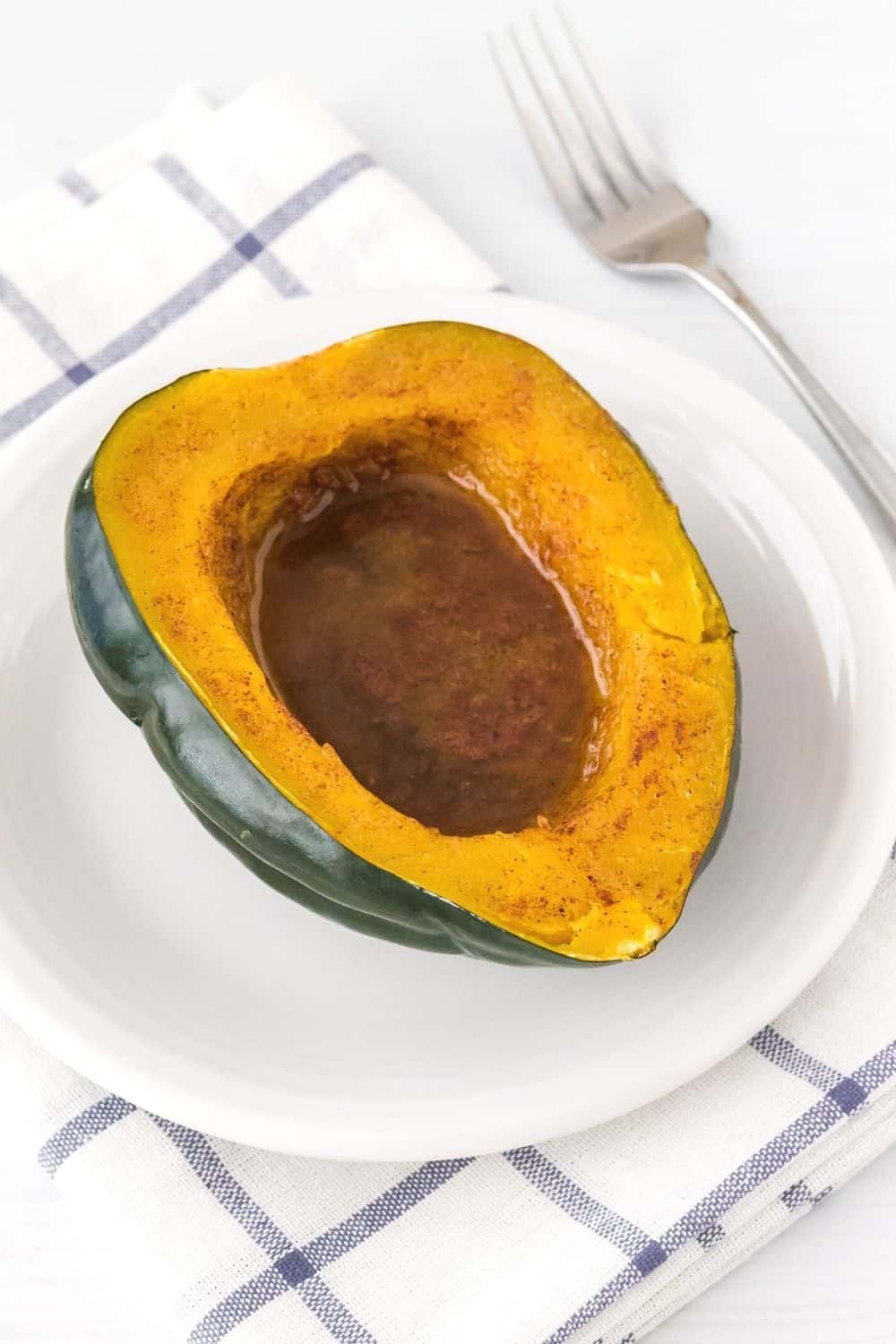 acorn squash on a white plate