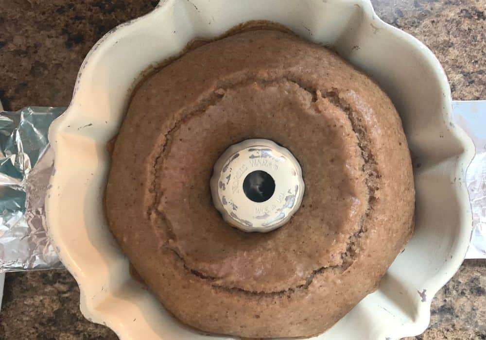 Instant Pot applesauce bundt cake freshly "baked" in the pressure cooker, still in the pan