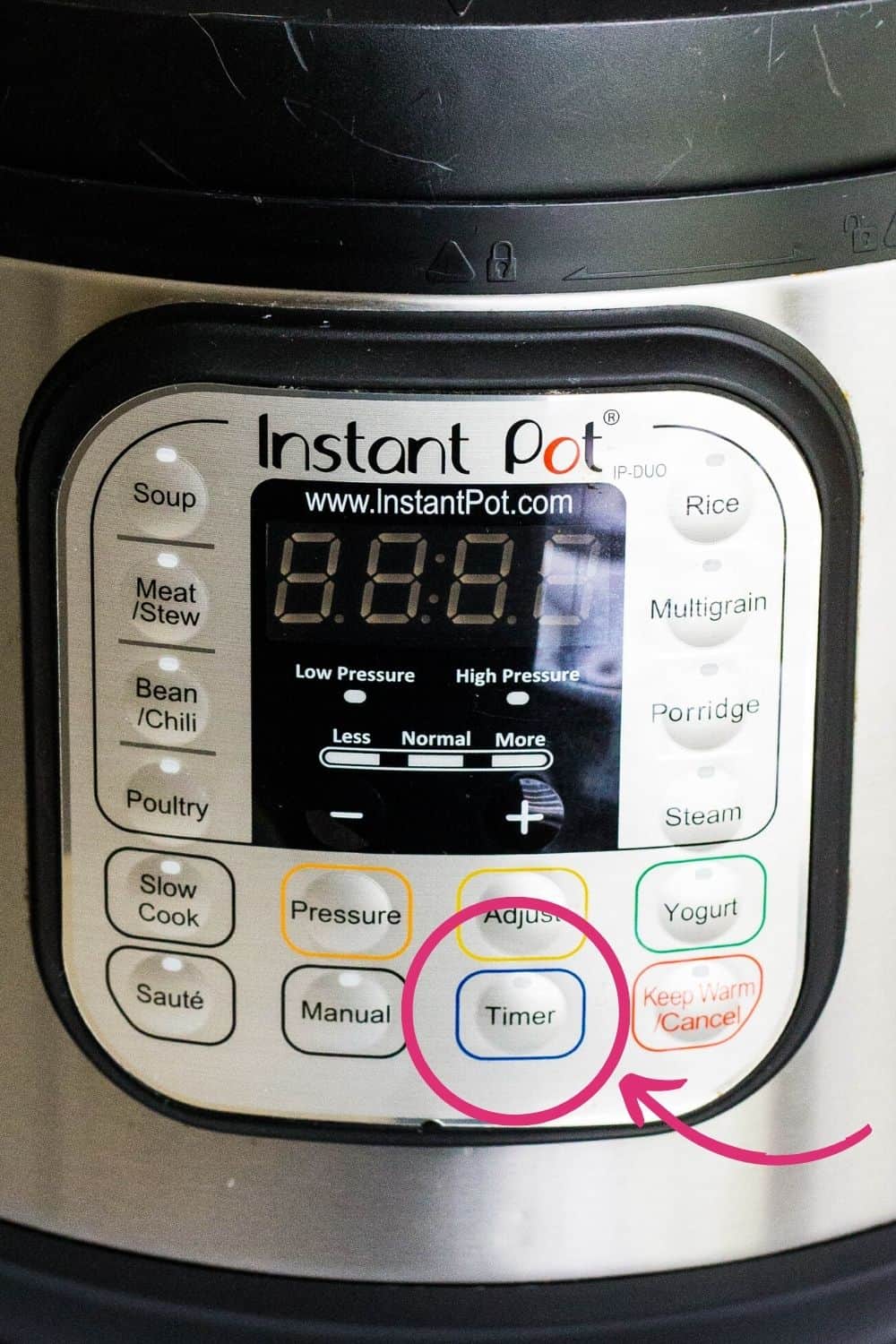 close-up of an Instant Pot Timer button on the control panel