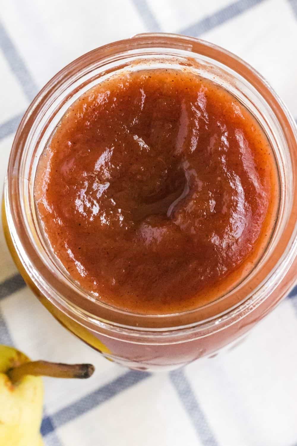 overhead view of the mouth of a jar of homemade pear butter