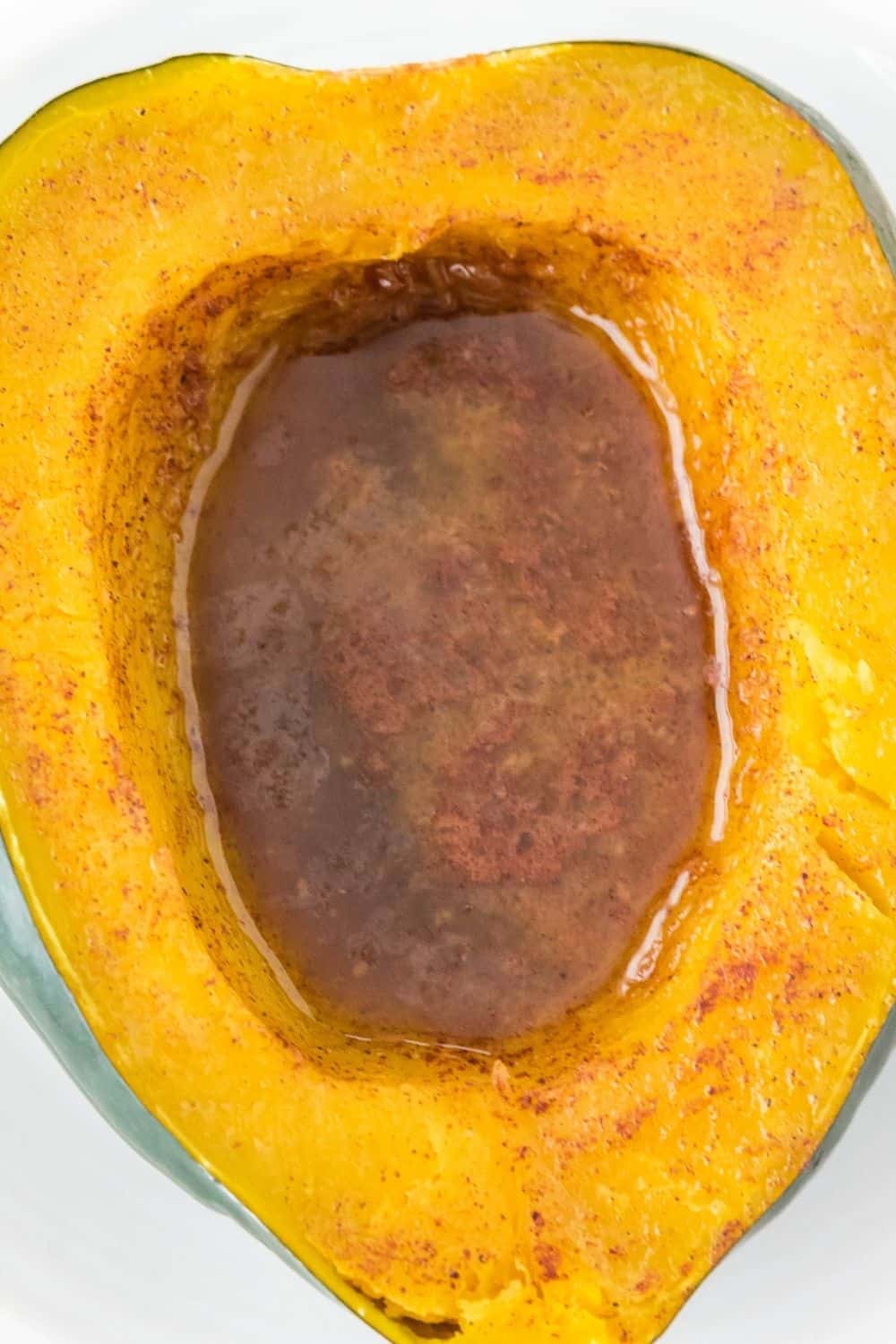 overhead close-up view of Instant Pot acorn squash on a white plate