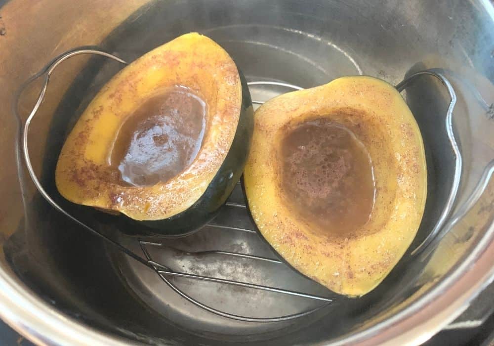 tender acorn squash in the instant pot after cooking