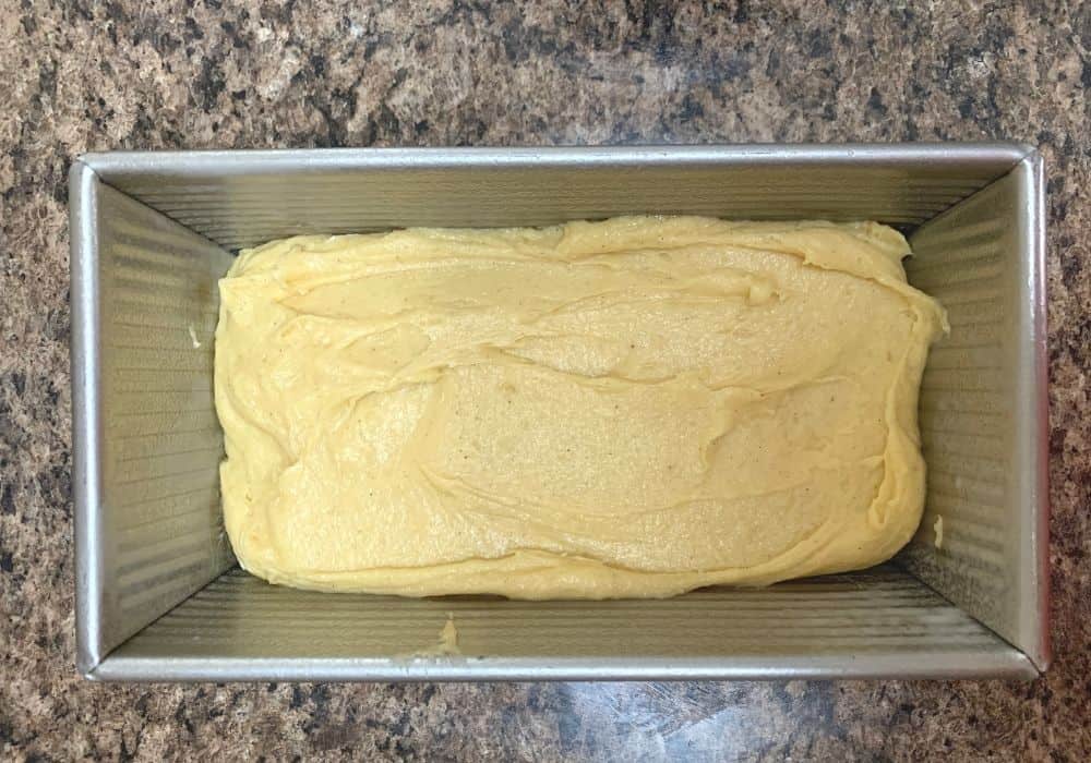 eggnog quickbread batter in a loaf pan