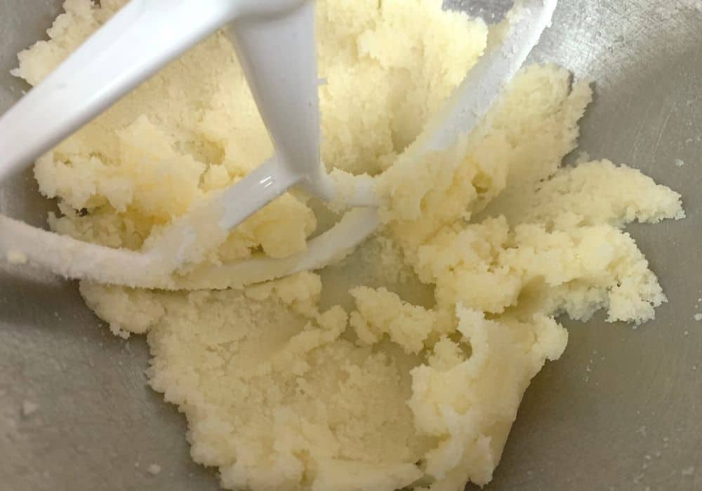 butter and sugar creamed together in the bowl of a stand mixer