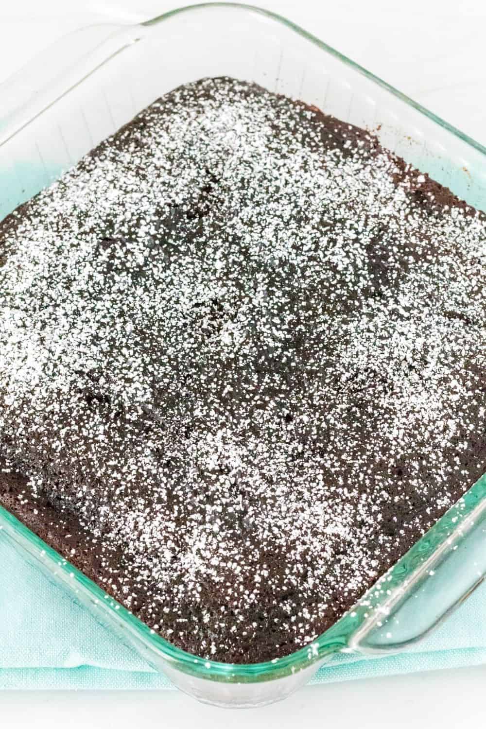 freshly baked chocolate cake from scratch in a square pan