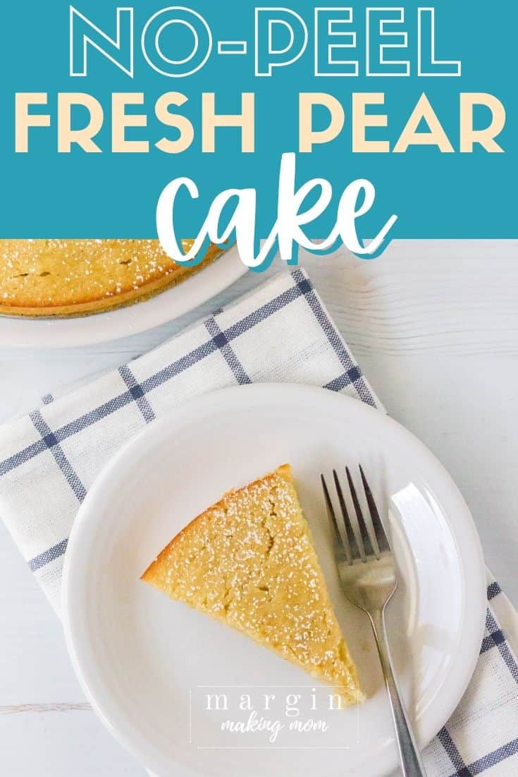 overhead view of a slice of no-peel fresh pear cake on a white plate atop a blue and white napkin, with the remainder of the cake in the background