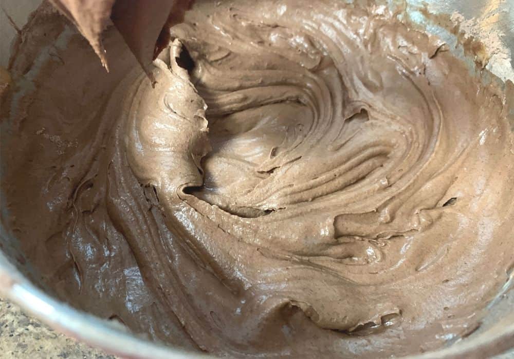 thick batter for chocolate cream cheese pound cake in a mixing bowl