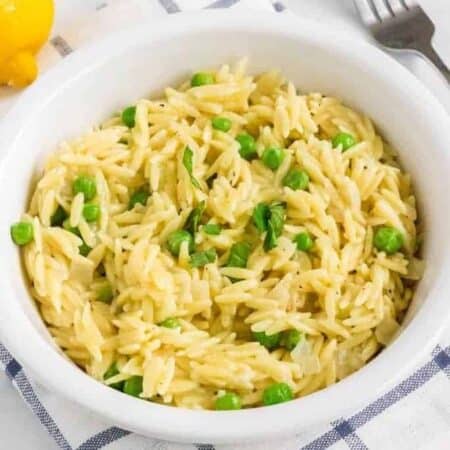 white bowl filled with Instant Pot lemon parmesan orzo