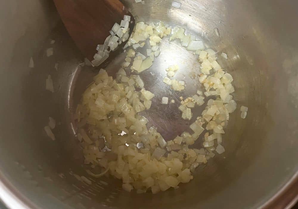 onions and garlic sauteed in butter in the insert pot of the Instant Pot.