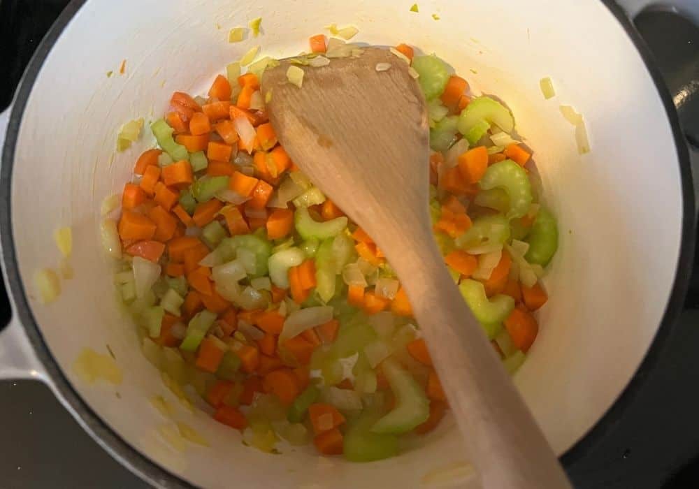 onions, celery, and carrots sauteed in olive oil in a small dutch oven