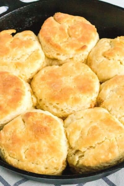 close-up view of freshly baked homemade biscuits in a cast iron pan