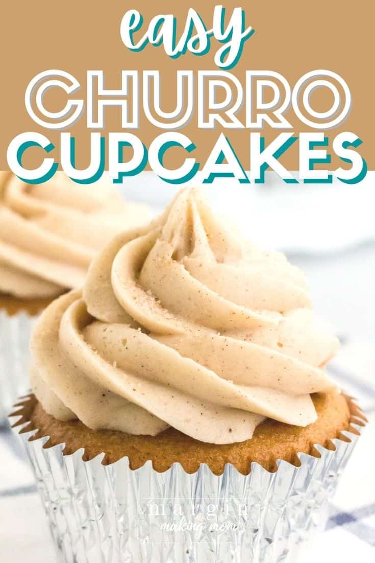 a churro cupcake in a foil liner, topped with cinnamon cream cheese frosting and a sprinkling of cinnamon sugar.