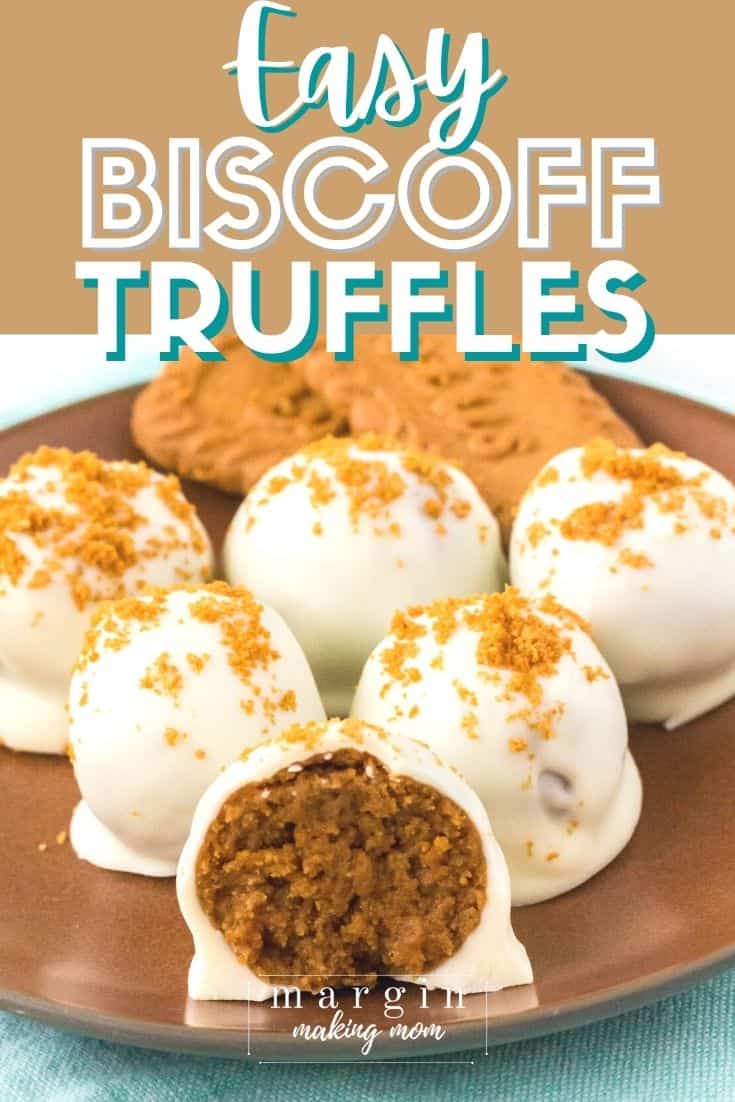 several white chocolate coated Biscoff truffles on a brown plate, with two Lotus Biscoff cookies on the plate as garnish