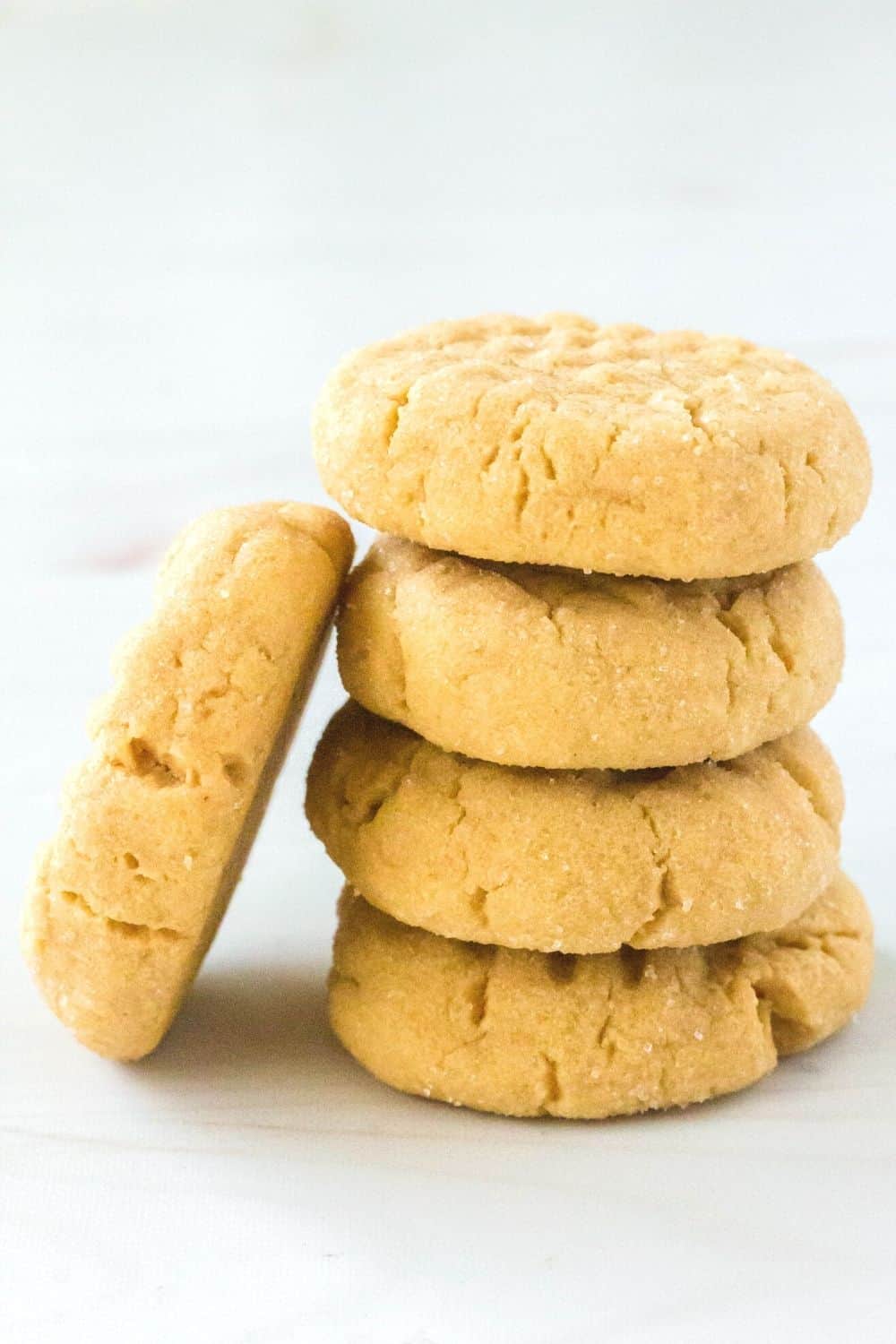 side view of a stack of peanut butter cookies made from cake mix.