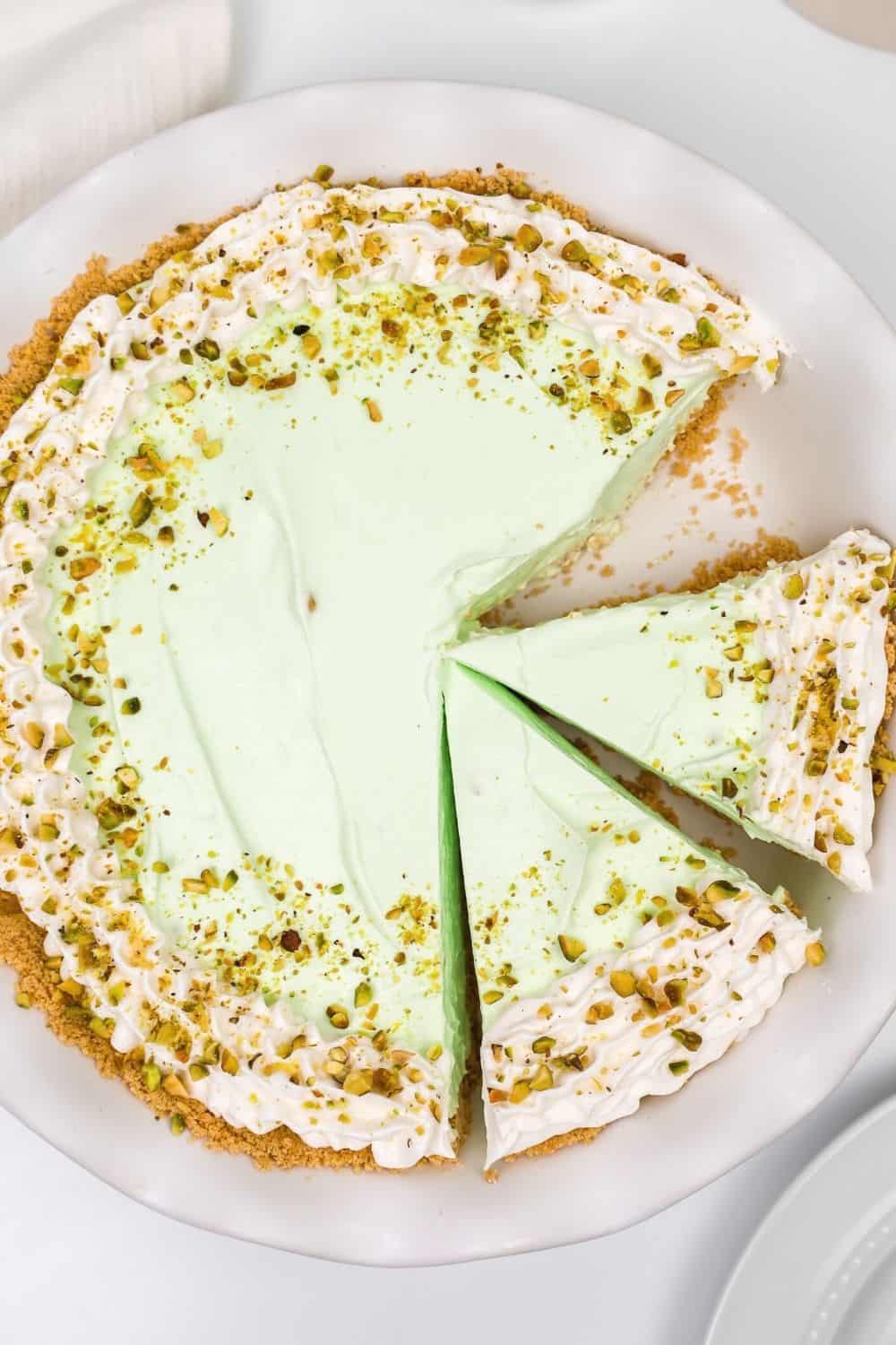 overhead view of a pie plate serving pistachio pudding pie
