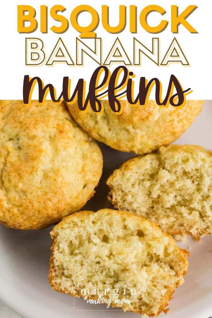 Bisquick banana muffins on a white plate, with one muffin cut in half to display the moist and tender interior