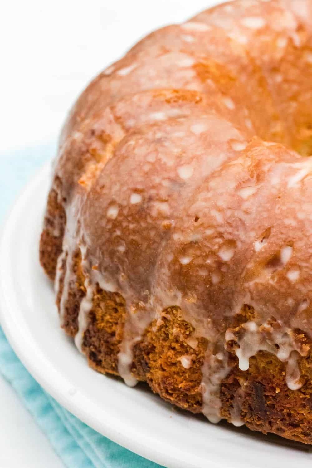 close-up view of the side of a pineapple pound cake with glaze on it