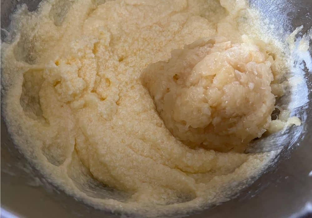 canned pineapple added to the wet ingredients of the cake batter.
