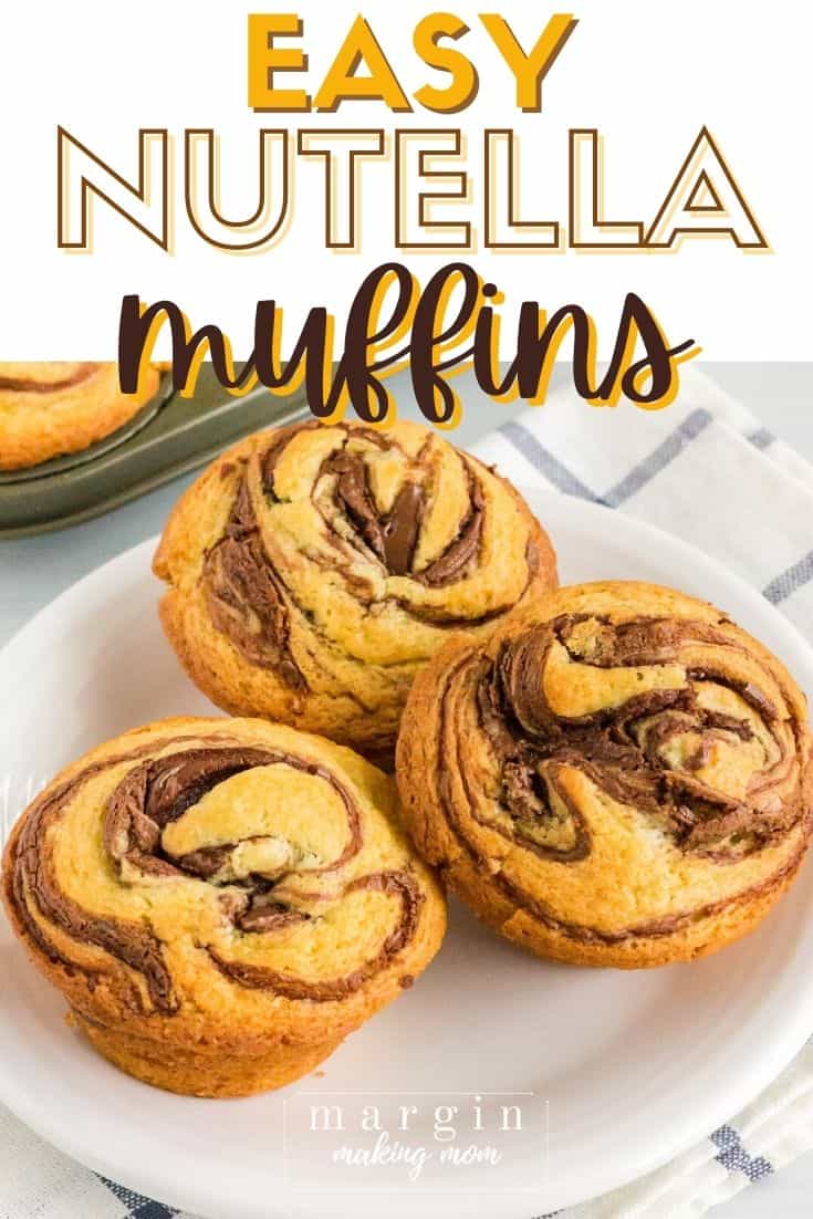 three Nutella swirl muffins on a white plate