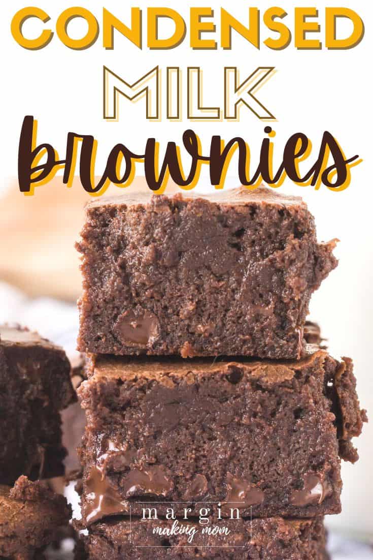 close-up side view of a stack of condensed milk brownies, showing the moist interior