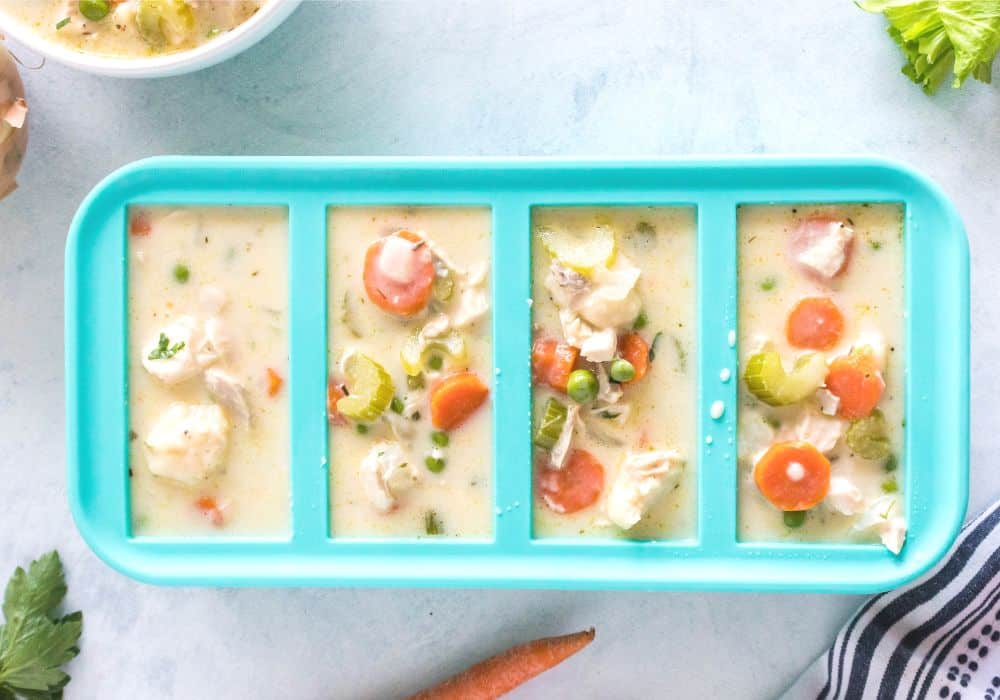 leftover chicken and dumpling soup in a Souper Cubes silicone freezer container