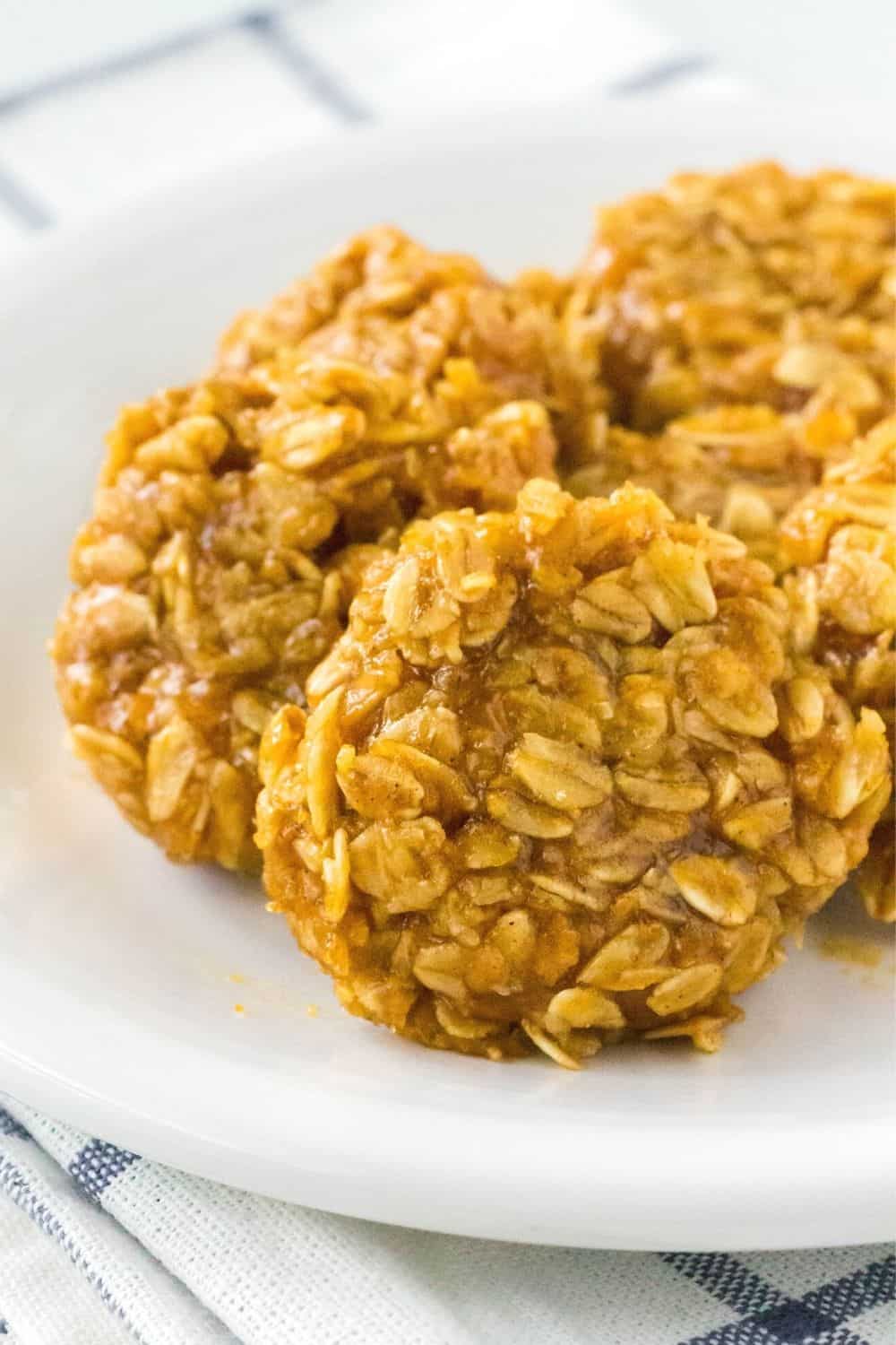 several no bake pumpkin cookies served on a white plate