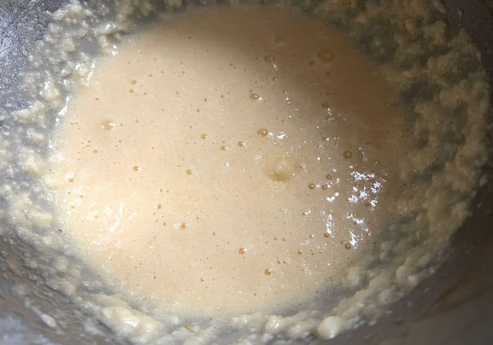eggs and vanilla extract mixed into butter and sugar mixture