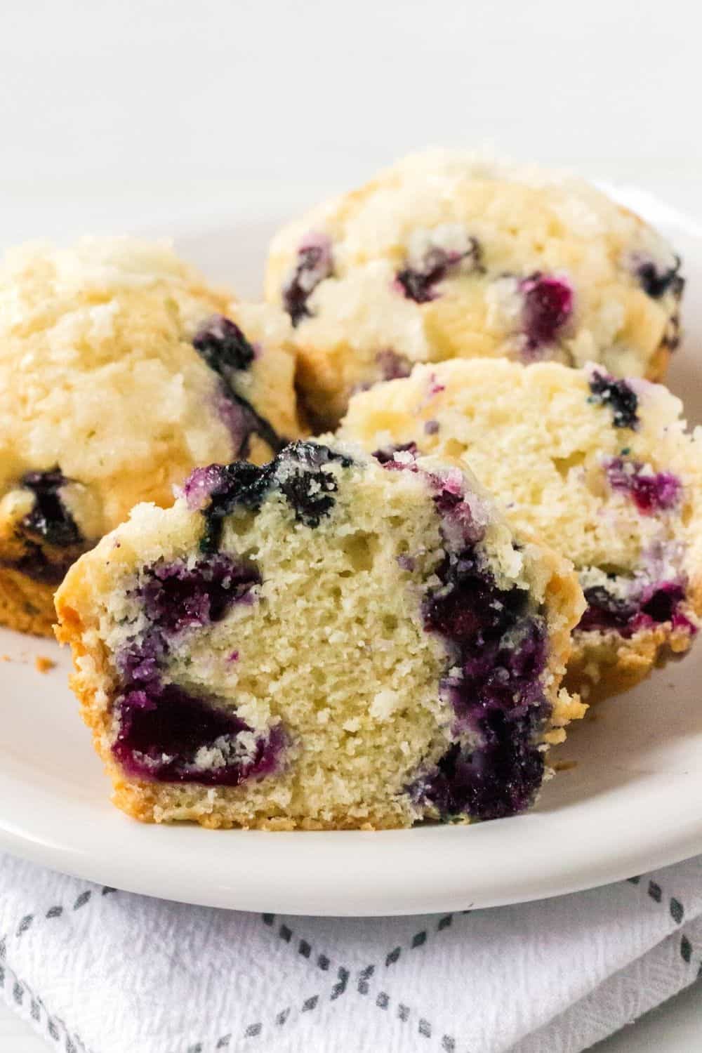 close-up view of the moist interior of easy blueberry muffins made with bisquick baking mix