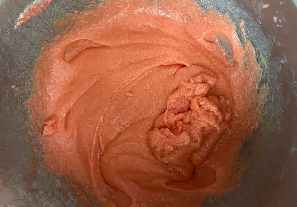 strawberry cake batter after eggs and vanilla extract have been added