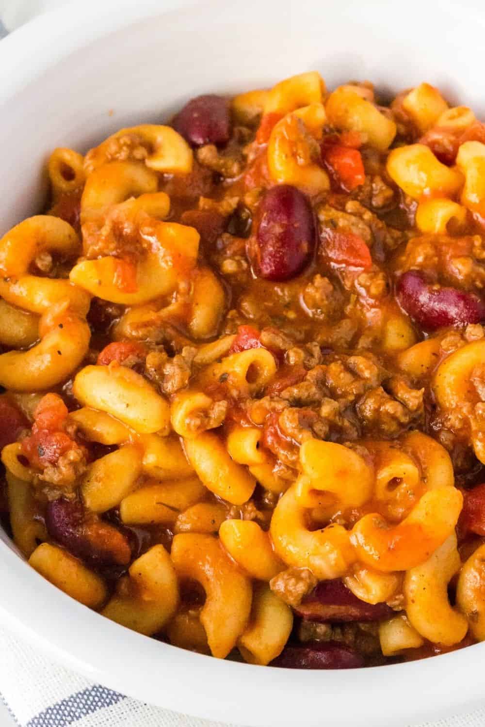 close-up detail view of pressure cooker chili mac served in a white bowl