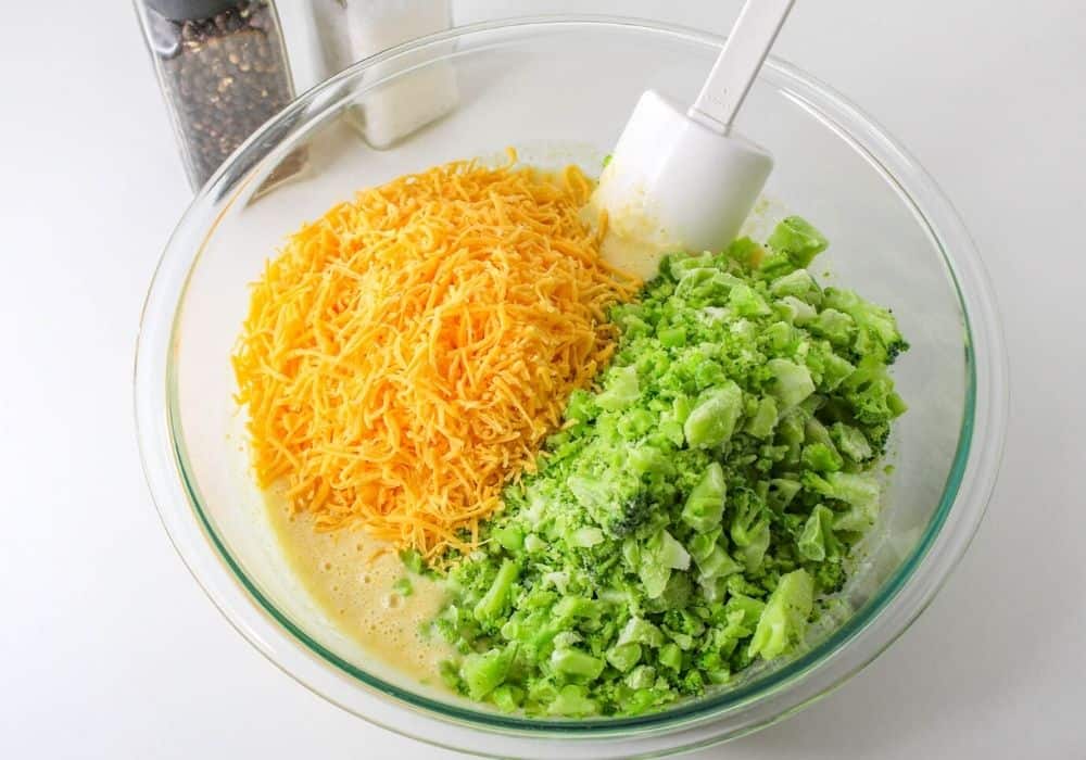 shredded cheese and frozen broccoli pieces added to the mixture