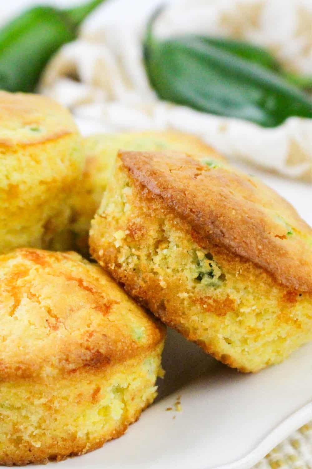 freshly baked cornbread muffins made with jalapenos and cheese.