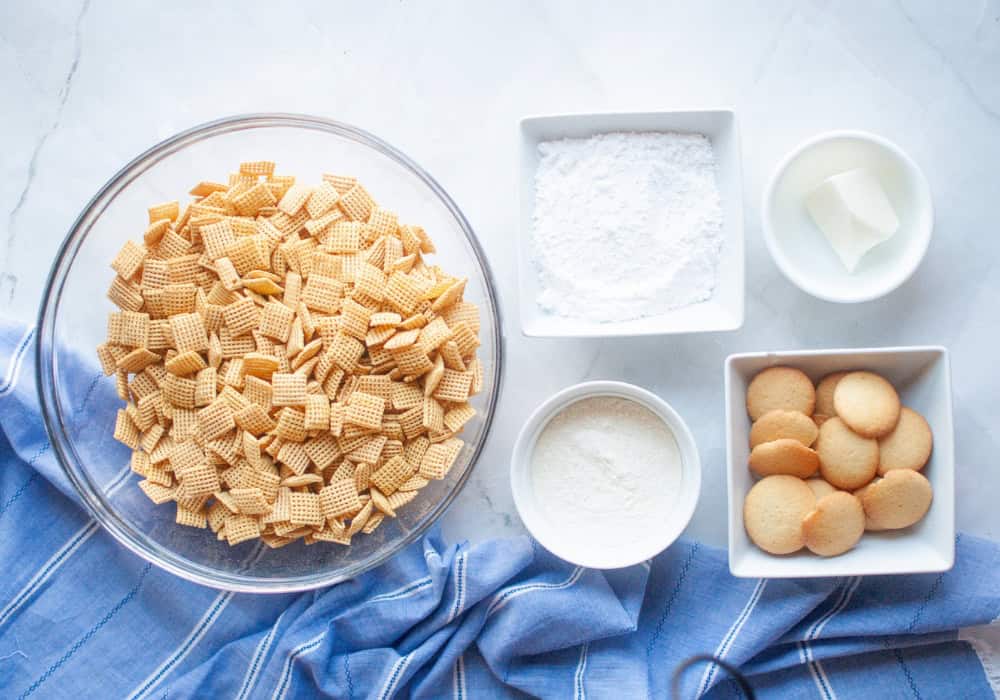 overhead view of in gredients needed for making banana pudding Muddy Buddies.