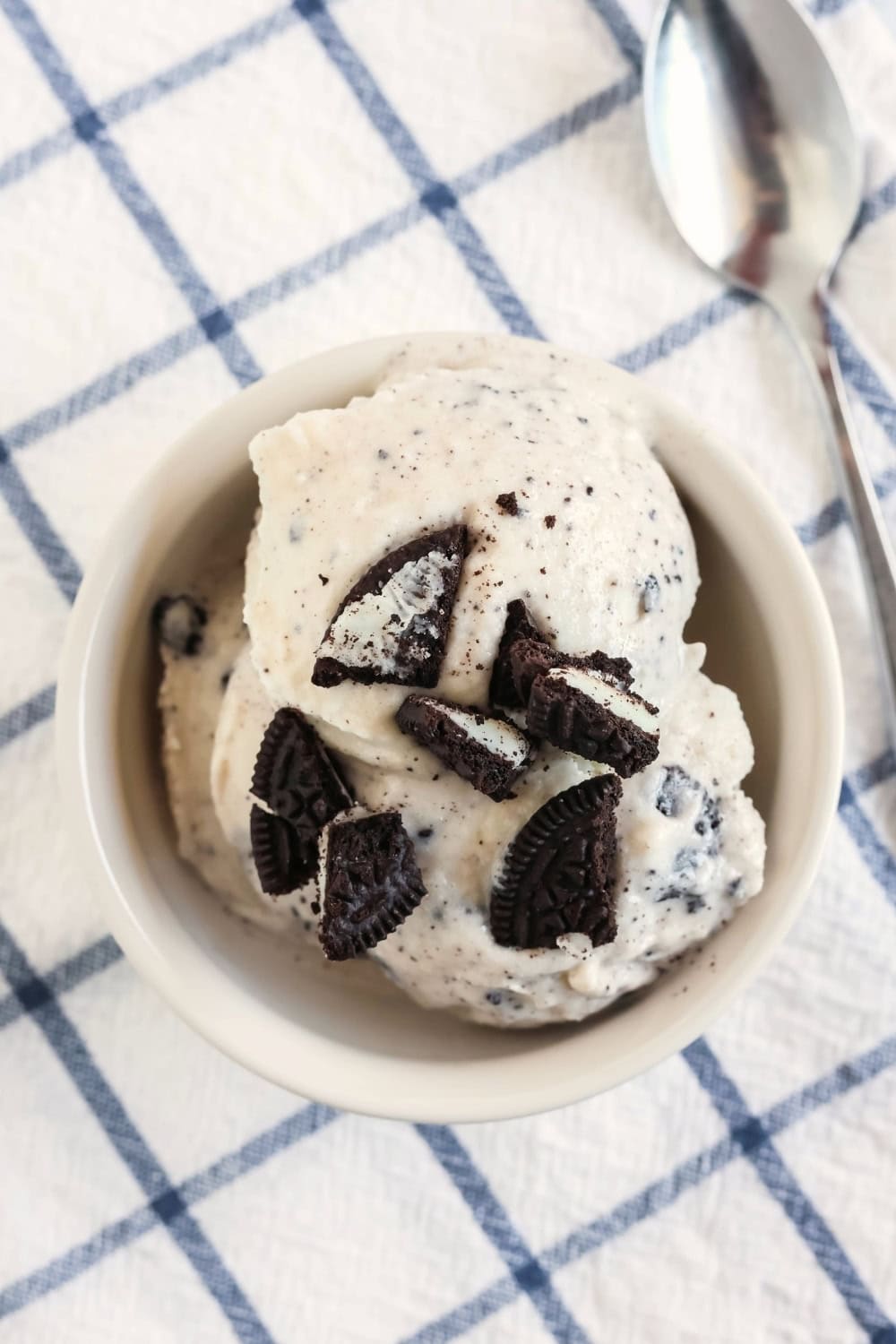overhead view of a bowl of cookies and cream frozen yogurt that was made in the Ninja Creami.