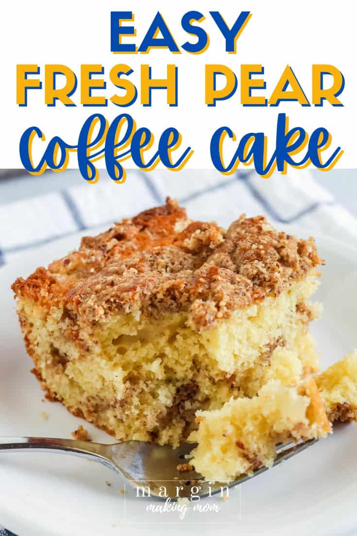 close-up of a slice of pear coffee cake on a white plate, with a bite taken out of it on a fork.