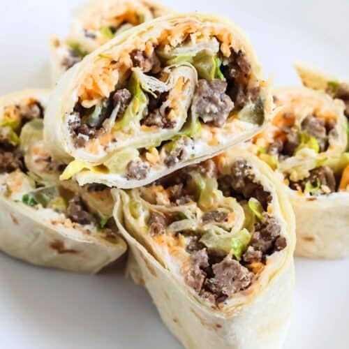 Big Mac pinwheels on a white appetizer plate.