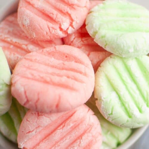 sugar free cream cheese mints served in a white bowl.