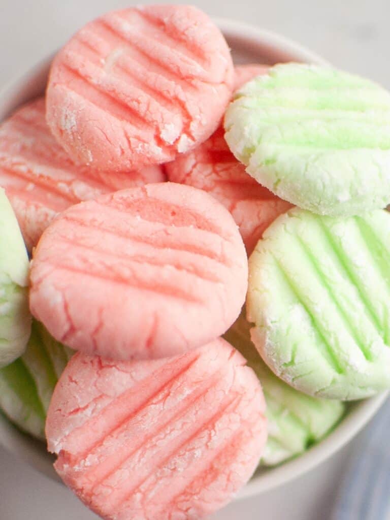 sugar free cream cheese mints served in a white bowl.