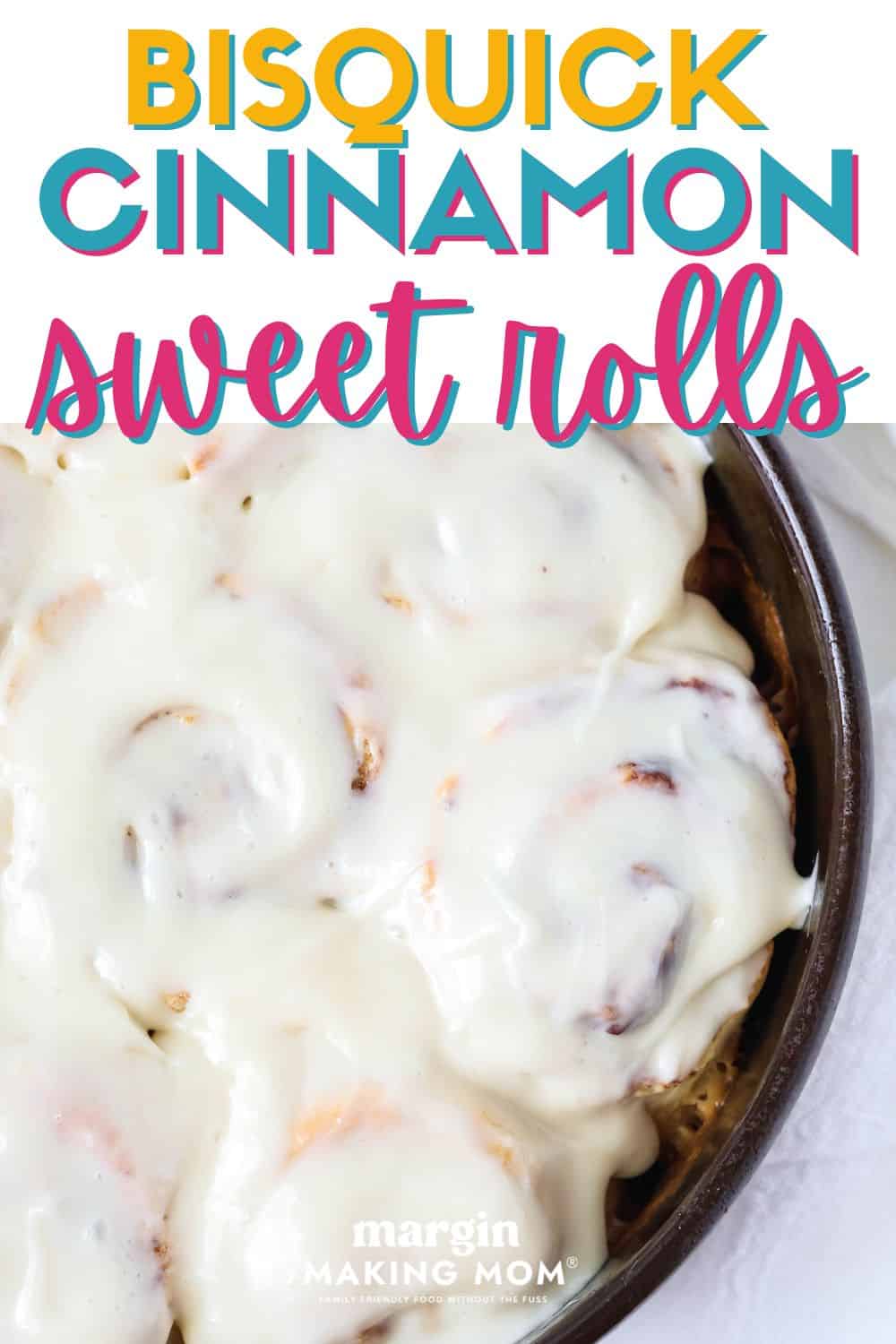 overhead close-up view of a pan of iced Bisquick cinnamon rolls.
