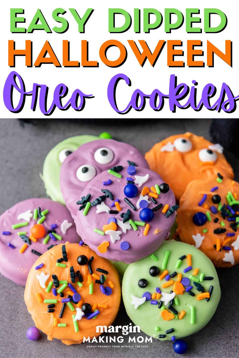 several dipped Halloween Oreos clustered together, showcasing various colors and sprinkles.