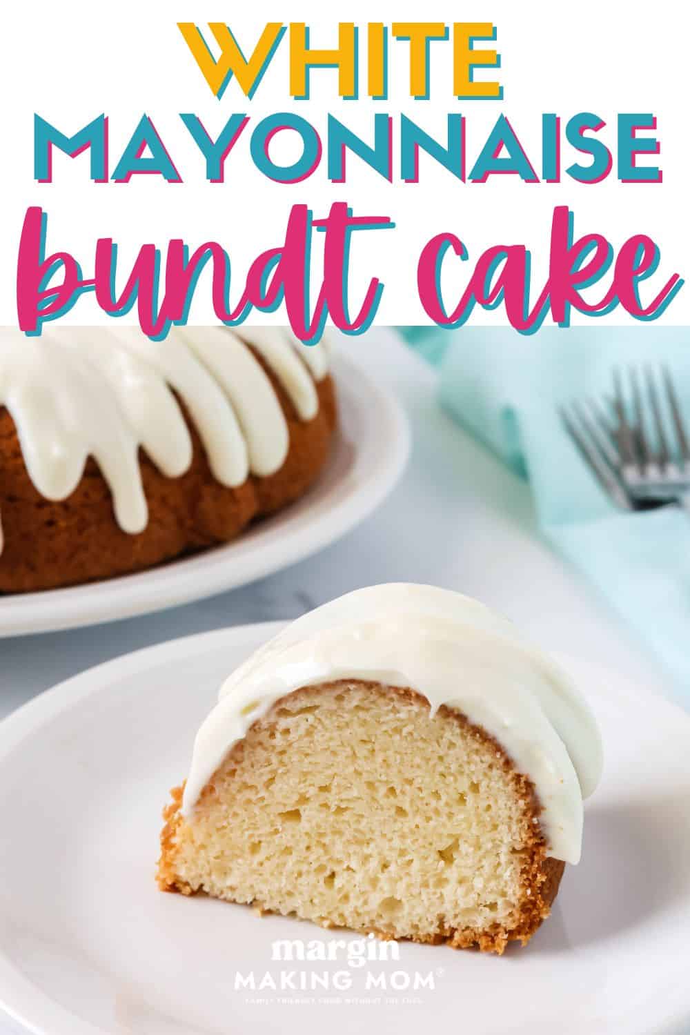 a slice of white mayonnaise cake is served on a white plate. It's topped with cream cheese icing. The bundt cake is on a plate in the background.