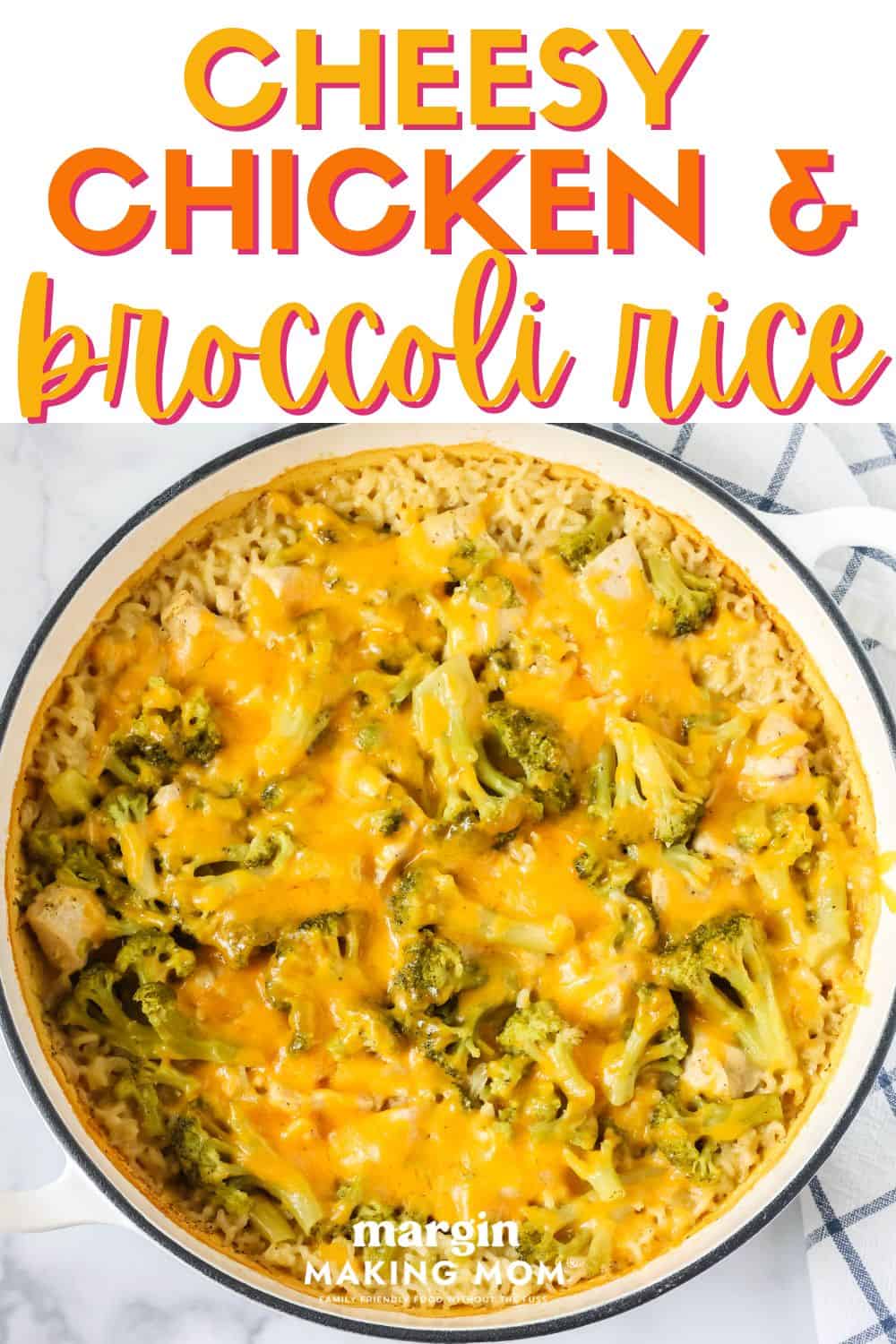 overhead view of a Dutch oven containing chicken, broccoli, and rice casserole covered in melted cheese.