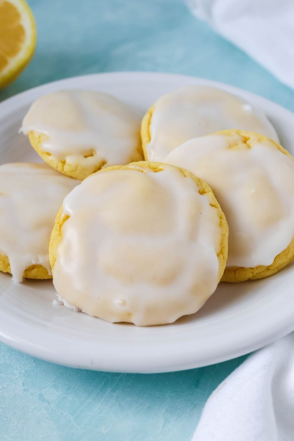 close-up of the satiny lemon icing that hardens on top of the lemon cake mix cookies.