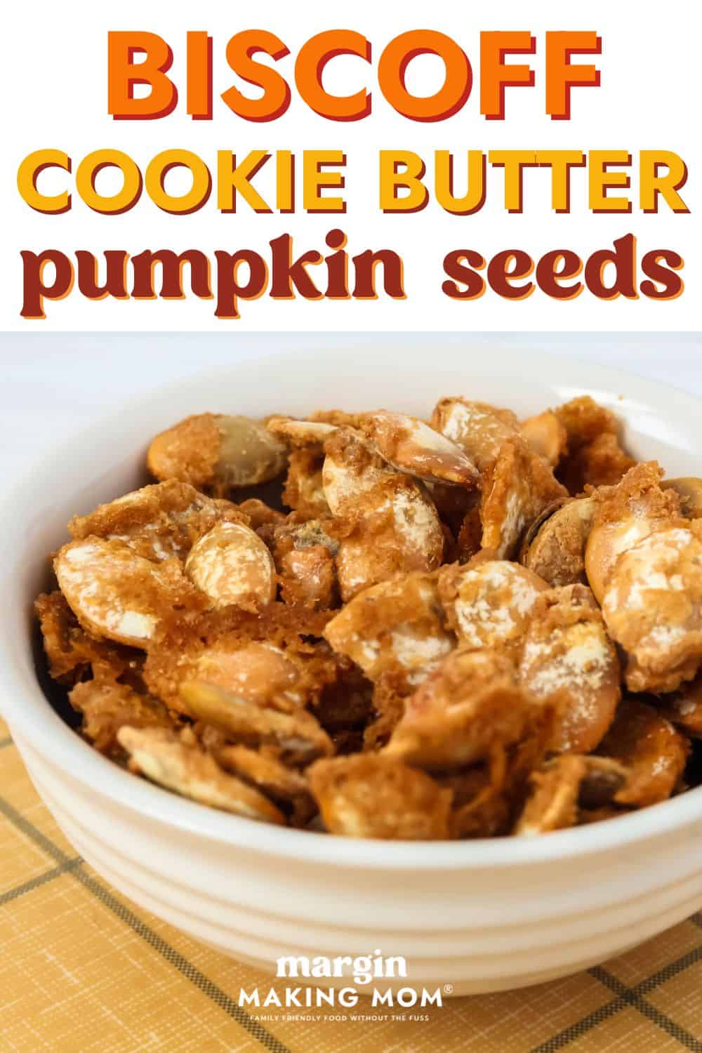 close-up view of Biscoff cookie butter pumpkin seeds in a white bowl.