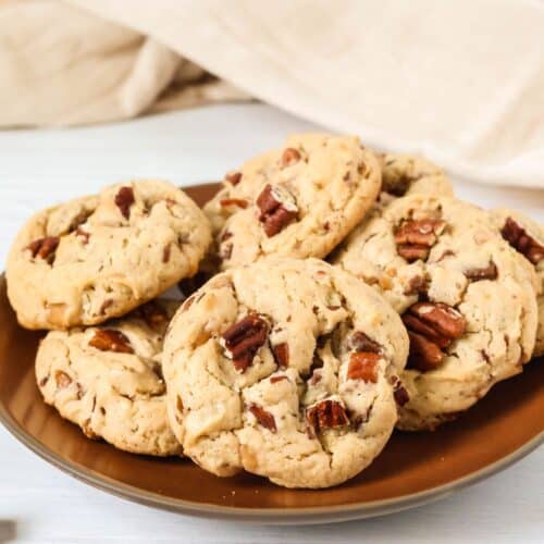 Cake mix butter pecan cookies served on a brown plate.