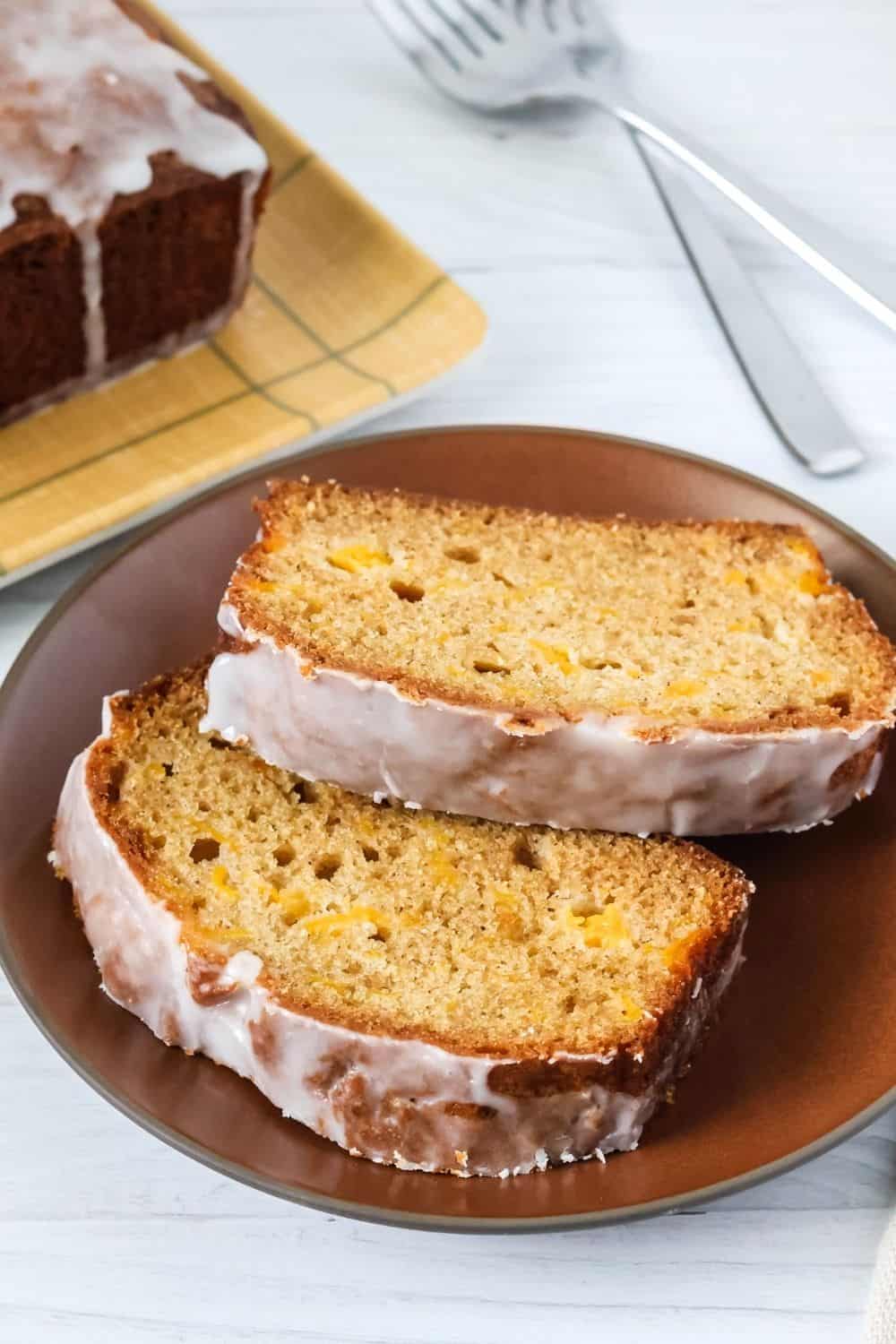 peach cobbler bread slices served on a brown plate.